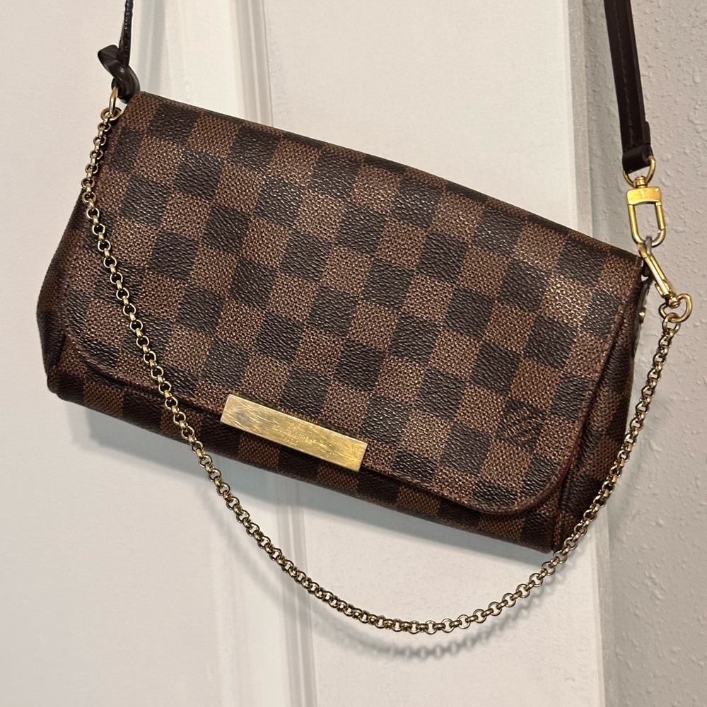 Louis Vuitton Eva Clutch in Damier Ebene Canvas